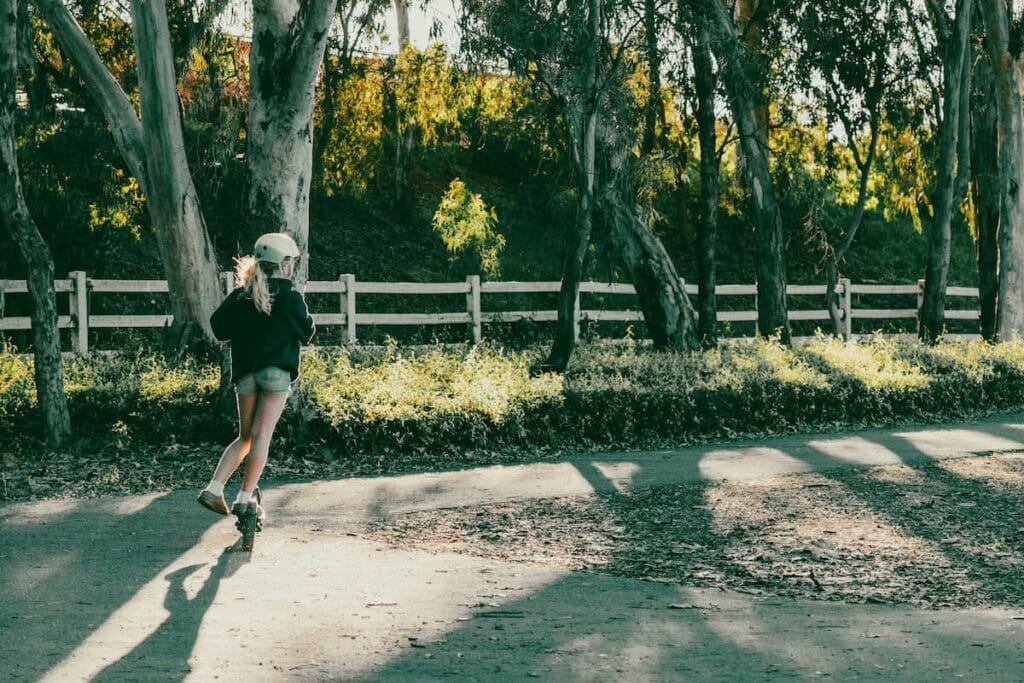 Woman doing a brisk walk outdoors, healthy habit to support circulation and blood flow